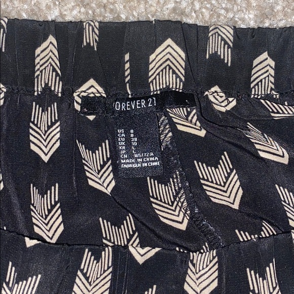 Fabric Black and Tan patterned shorts - Picture 3 of 3